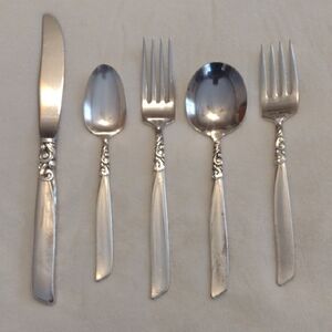 Classic Silver Flatware Set with Ornate Handles